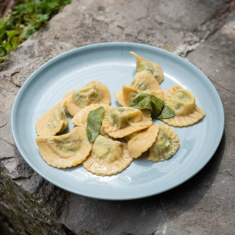 Ricotta & Spinach Mezzelune with sage-infused olive oil